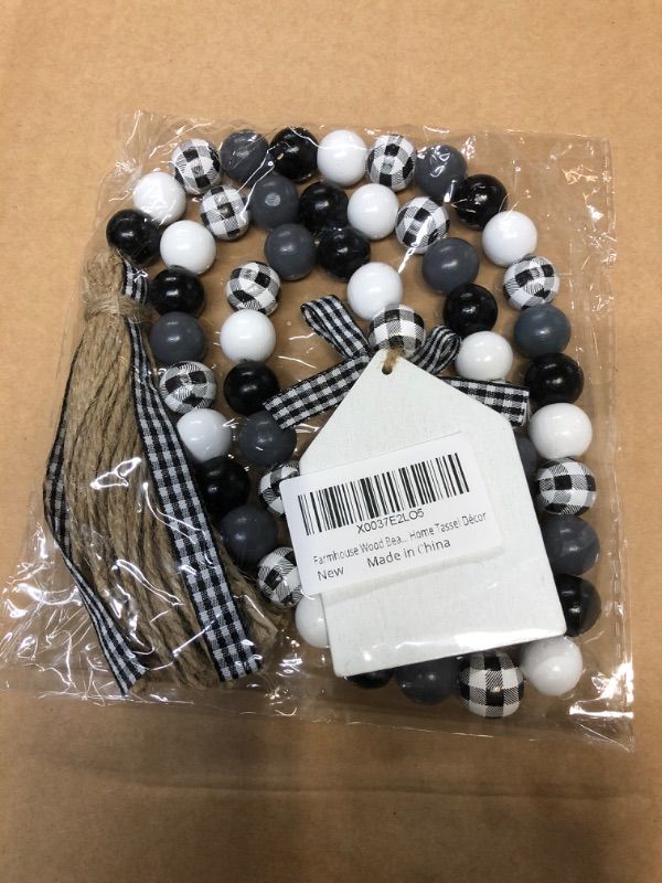 Photo 2 of 
Roll over image to zoom in
JOTFA Farmhouse Wood Bead Garland, Black & White Plaid Rustic Wooden Beads with Black Jute Buffalo Plaid Tassels Rustic Wooden HOME Sign for Farmhouse Tiered Tray Décor Natural Country Chic Home Décor