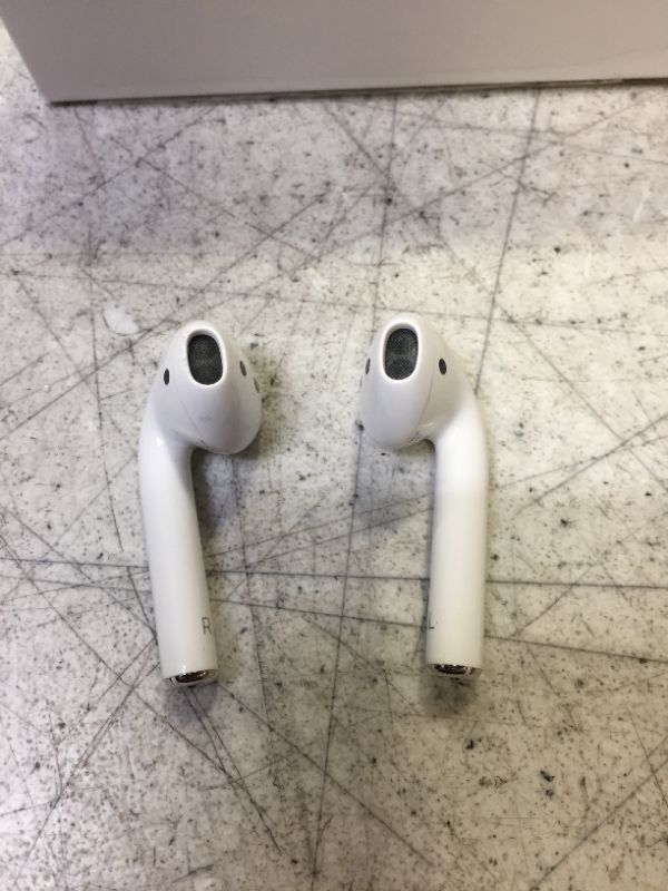 Photo 3 of Apple AirPods (2nd Generation) Wireless Earbuds with Lightning Charging Case Included. Over 24 Hours of Battery Life, Effortless Setup. Bluetooth Headphones for iPhone- 
