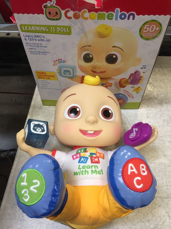 Photo 2 of CoComelon Interactive Learning JJ Doll with Lights, Sounds, and Music to Encourage Letter, Number, and Color Recognition, Kids Toys for Ages 18 Month