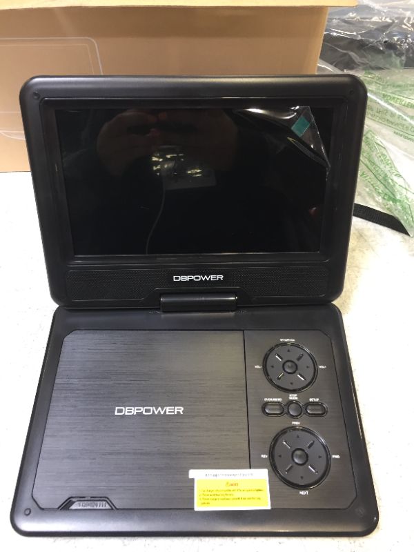 Photo 2 of DBPOWER 11.5" Portable DVD Player, 5-Hour Built-in Rechargeable Battery, 9" Swivel Screen, Support CD/DVD/SD Card/USB, Remote Control, 1.8 Meter Car Charger, Power Adaptor and Car Headrest (Black)
