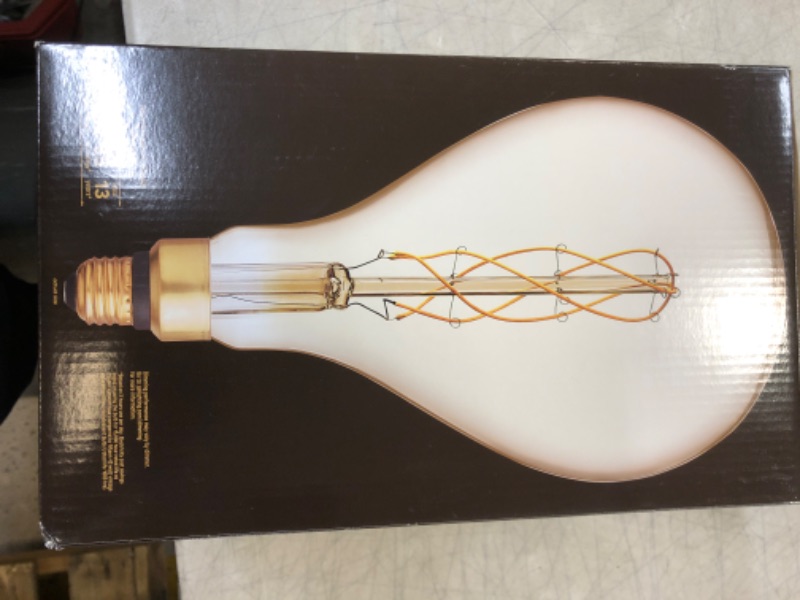 Photo 2 of GE 6.5W 40W Equivalent LED Light Bulb Amber Glass Warm Candle Light