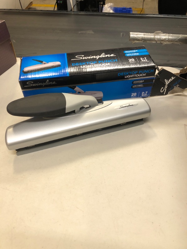 Photo 2 of ** USED ** Swingline Desktop Hole Punch, Light Touch Metal Hole Puncher with Adjustable System for 2-7 Holes, Low Effort Paper Punch, Home School & Home Office Supplies, 20 Sheet Capacity, Black/Silver (74030)
