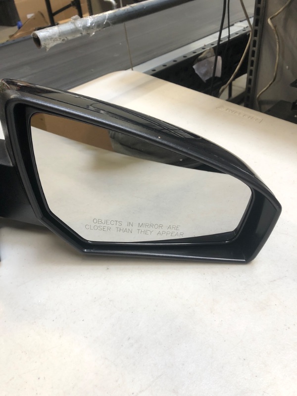 Photo 3 of Dorman 955-983 Passenger Side Door Mirror for Select Nissan Models
SCRATCHES ON BACK OF MIRROR