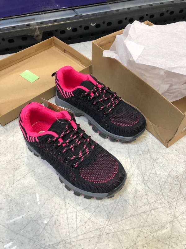 Photo 1 of BIG KIDS BLACK AND PINK SNEAKERS SIZE 12 