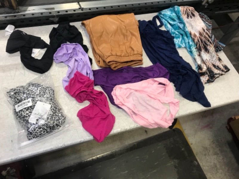 Photo 1 of 10 ITEM ASSORTED BAG LOT 
VARIES CLOTHING AND SIZES