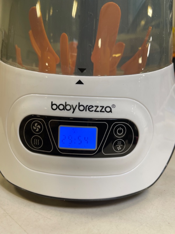 Photo 3 of Baby Brezza Baby Bottle Sterilizer and Dryer Machine – Electric Steam Sterilization - Universal Fit - Pacifiers, Glass, Plastic, and Newborn Feeding Bottles
