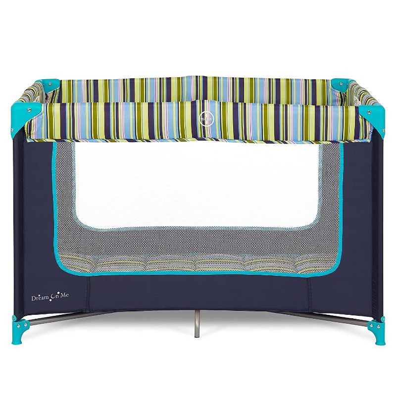 Photo 1 of Dream On Me Zodiak Portable Playard in Navy, Lightweight, Packable and Easy Setup Baby Playard, Breathable Mesh Sides and Soft Fabric - Comes with a Removable Padded Mat

