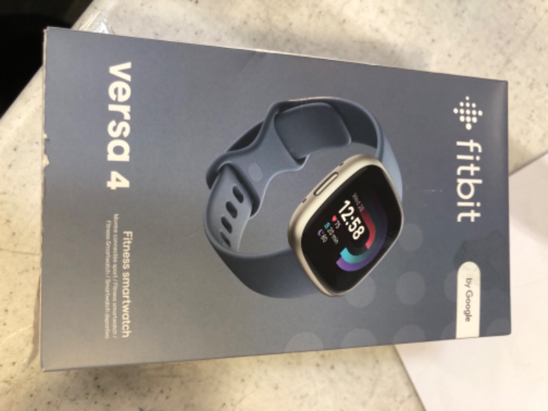 Photo 4 of Fitbit Versa 4 Fitness Smartwatch - Waterfall Blue/Platinum Aluminum
