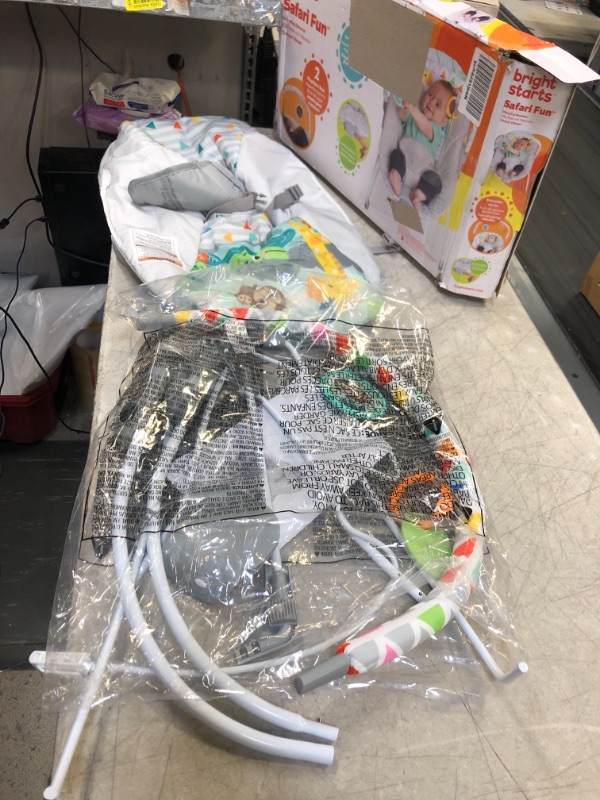 Photo 1 of Bright Starts Vibrating Bouncer Seat with Toy Bar - Safari Fun ( BOX HAS MINOR DAMAGE )
