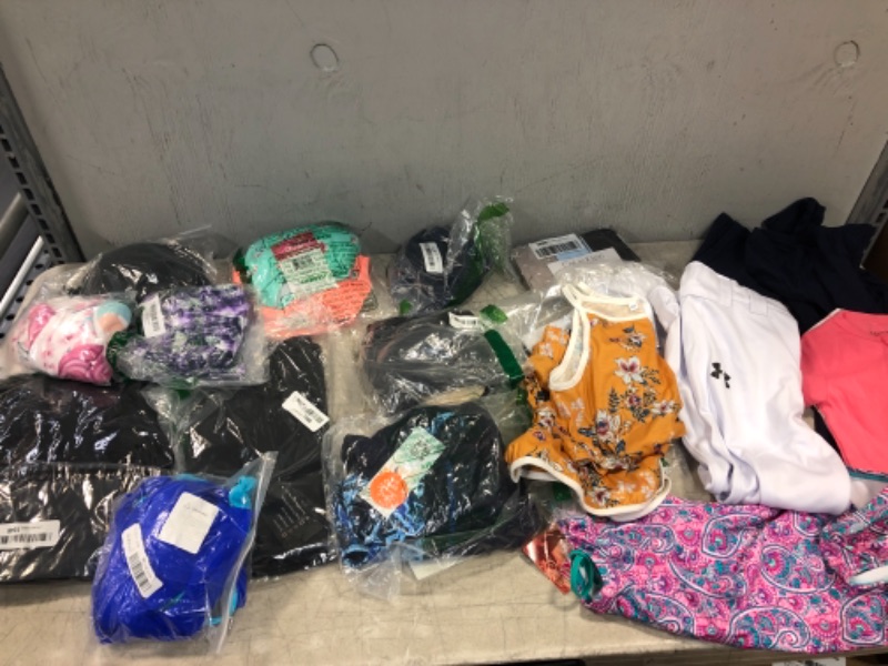 Photo 1 of Assorted Clothes Various Sizes and Styles Sold As Is