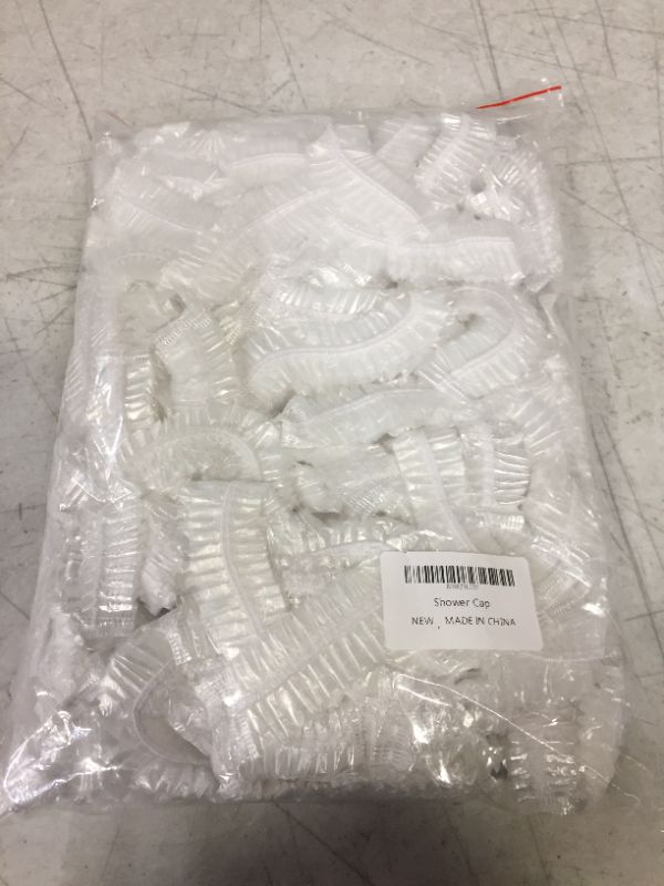 Photo 1 of 100PCS Shower Caps, Plastic Clear Bath Hair Cap and Disposable Waterproof Bath Caps with Elastic Band for Hair Treatment, Spa, and Hair Solon, Hotel and Home Use (Size 16.5IN)
