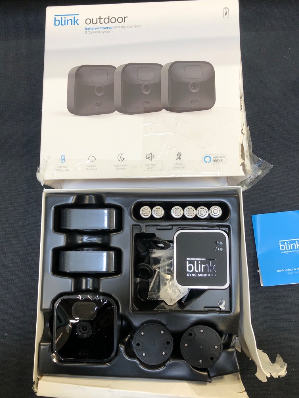 Photo 1 of Blink Outdoor - wireless, weather-resistant HD security camera, two-year battery life, motion detection, set up in minutes – 3 camera kit
