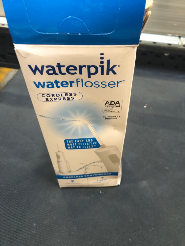 Photo 1 of Waterpik Cordless Water Flosser, Battery Operated & Portable for Travel ( used item )