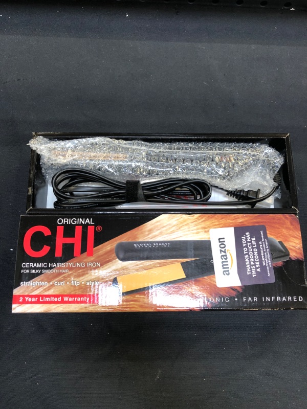 Photo 1 of CHI Original Ceramic Hair Straightening Flat Iron | 1" Plates | Black | Professional Salon Model Hair Straightener | Includes Heat Protection Pad
