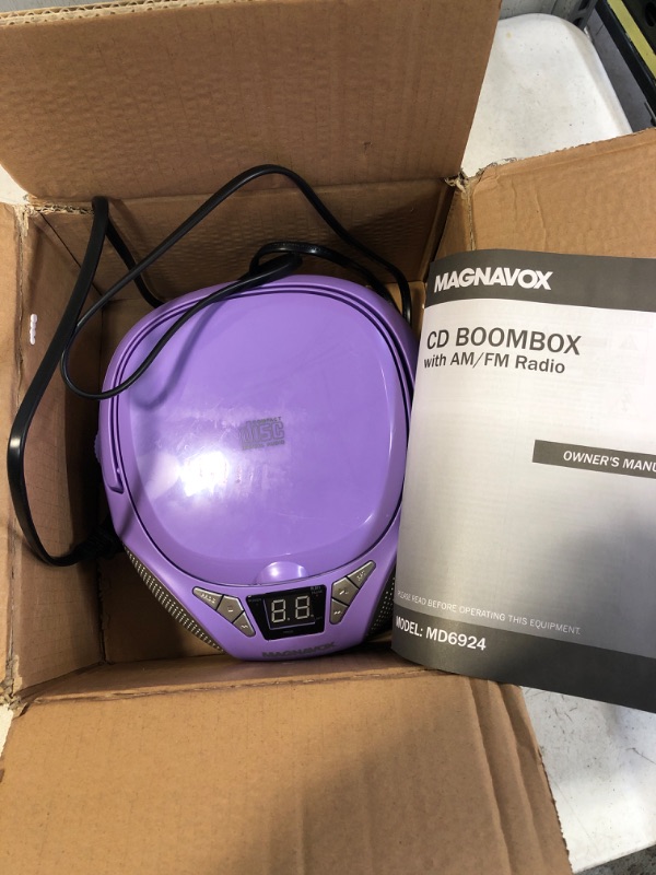 Photo 2 of Magnavox MD6924-PK Portable Top Loading CD Boombox with AM/FM Stereo Radio | CD-R/CD-RW Compatible | LED Display | AUX Port Supported | Programmable CD Player | PURPLE 
