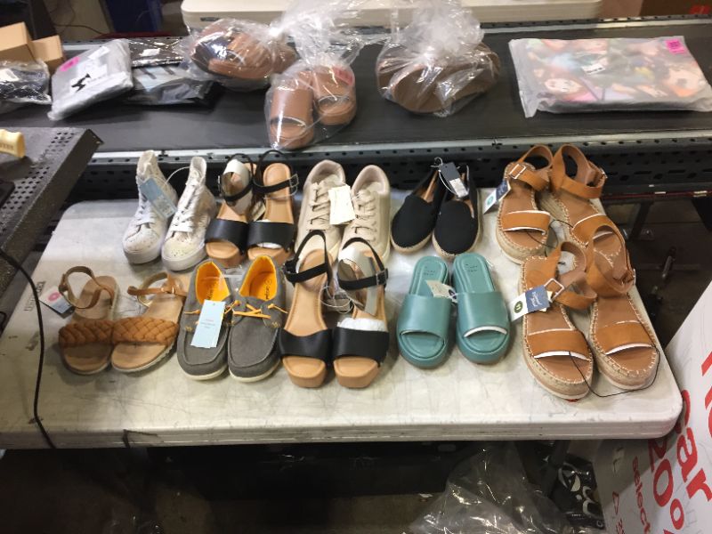 Photo 1 of Assorted Target shoes, assorted sizes and styles 