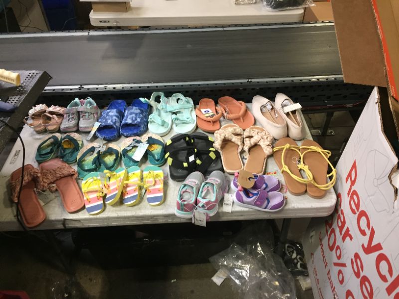 Photo 1 of Assorted Target shoes bundle, various sizes and styles **SLIGHTLY DIRTY FROM WAREHOUSE** 
