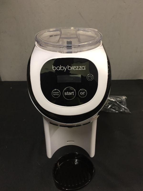 Photo 2 of Baby Brezza Formula Pro Mini Baby Formula Maker – Small Baby Formula Mixer Machine Fits Small Spaces and is Portable for Travel– Bottle Makers Makes The Perfect Bottle for Your Infant On The Go