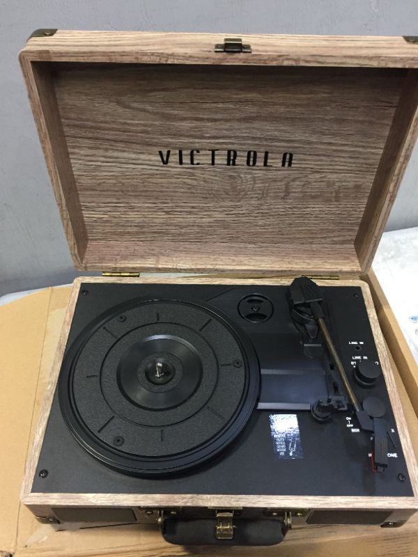 Photo 2 of Victrola Vintage 3-Speed Bluetooth Portable Suitcase Record Player with Built-in Speakers | Upgraded Turntable Audio Sound| Includes Extra Stylus | Oatmeal (VSC-550BT-FOT)