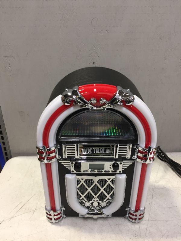 Photo 2 of Victrola Nostalgic Wood Countertop Jukebox with Built-in Bluetooth Speaker, 50's Retro Vibe, 5 Bright Color-Changing LED Tubes, FM Radio, Wireless Music Streaming, AM/FM Radio, Aux Input