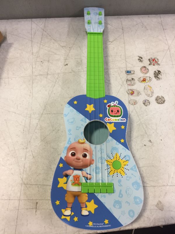 Photo 2 of CoComelon Musical Guitar by First Act, 23.5” Kids Guitar - Plays Clips of The ‘Finger Family’ Song - Musical Instruments for Kids, Toddlers, and Preschoolers