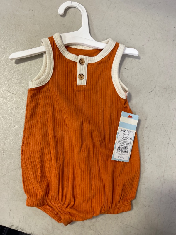 Photo 2 of Baby Ribbed Henley Bubble Romper - Cat & Jack™ Rust Orange
Size: 0-3M
Color: orange/rust