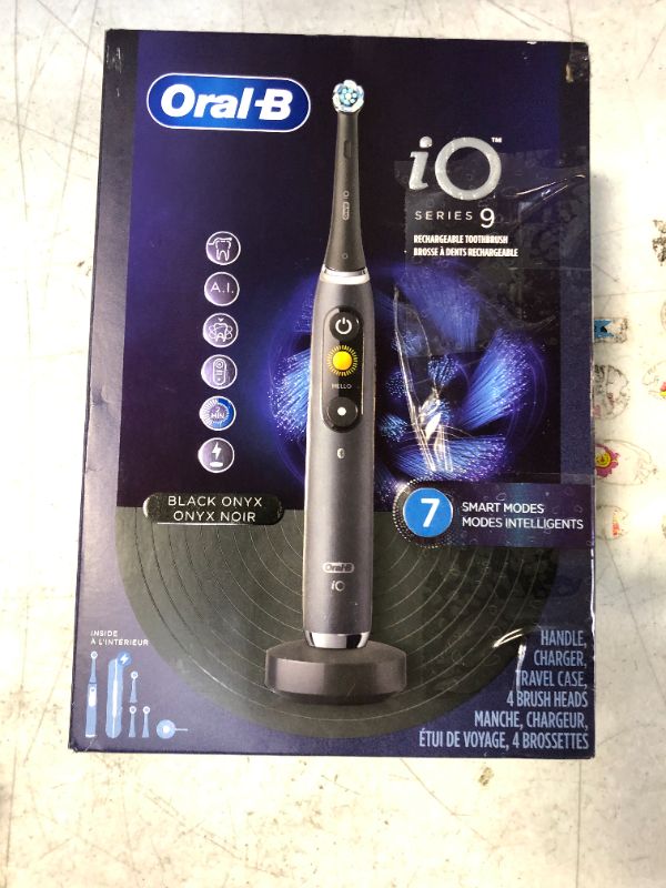 Photo 5 of Oral-B iO Series 9 Electric Toothbrush with 3 Replacement Brush Heads, Black Onyx