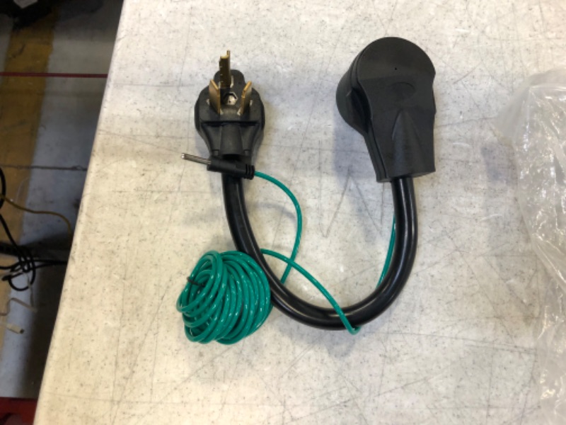 Photo 1 of  4 Prong to 3 Prong Dryer Plug Adapter with Green Ground Wire