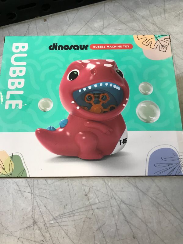 Photo 2 of Dinosaur Bubble Machine , Automatic Bubble Maker 500+ Bubbles Per Minute, Bubble Blower with 1 Bottle of Bubble Solution for Kids,Toddlers, Boys
