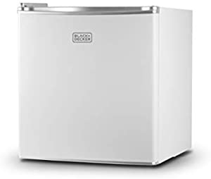 Photo 1 of BLACK+DECKER BCRK17W Compact Refrigerator Energy Star Single Door Mini Fridge with Freezer, 1.7 Cubic Ft., White -- minor dents in fridge
