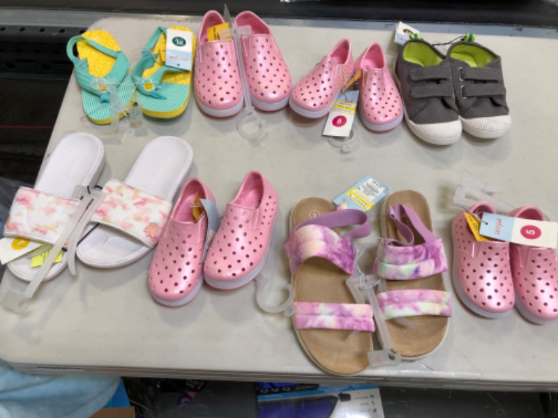 Photo 1 of bundle of kids shoes various sizes sold as is