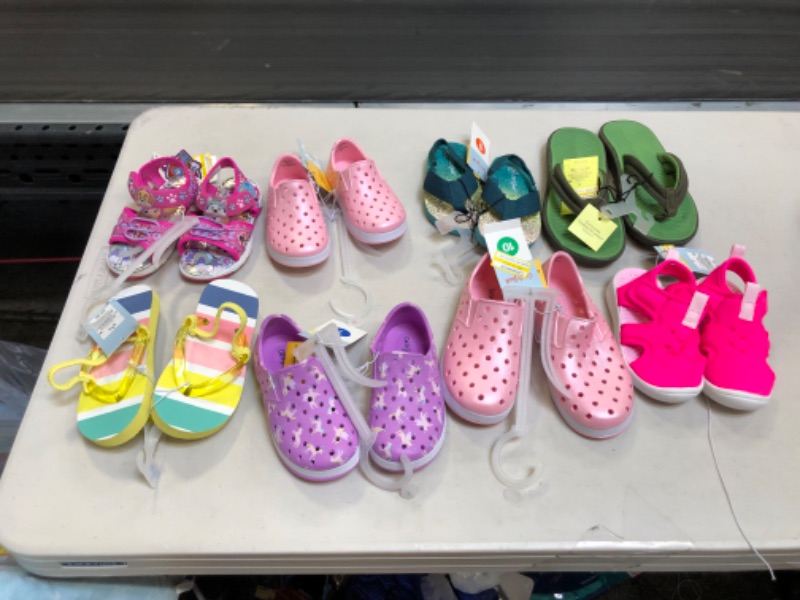 Photo 1 of bundle of kids shoes various sizes sold as is