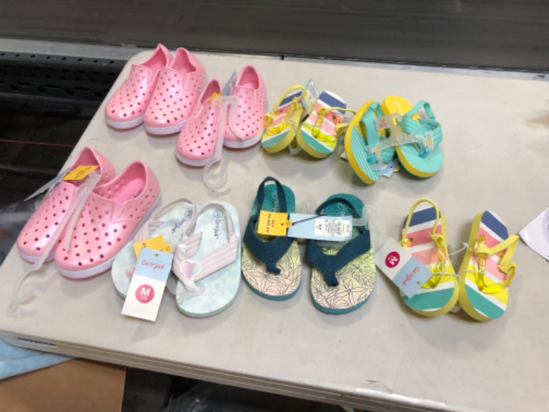 Photo 1 of bundle of kids shoes various sizes sold as is
