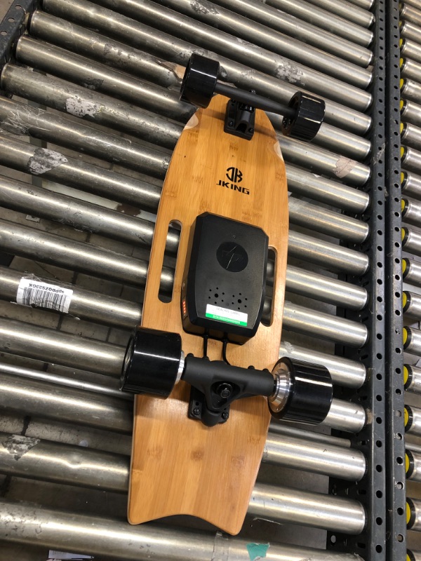 Photo 7 of Jking Electric Skateboard Electric Longboard with Remote Control Electric Skateboard,700W Hub-Motor ,16.7 MPH Top Speed,8.2 Miles Range,3 Speeds Adjustment
