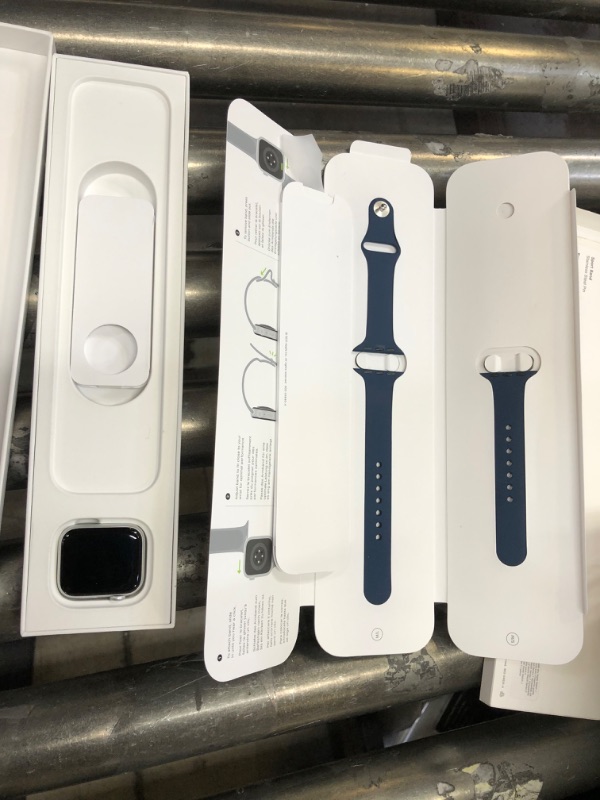 Photo 2 of Apple Watch SE (Gen 1) [GPS 41mm] Smart Watch w/ Silver Aluminium Case with Abyss Blue Sport Band. Fitness & Activity Tracker, Heart Rate Monitor, Retina Display, Water Resistant 41 mm GPS Silver Aluminium Case with Abyss Blue Sport Band