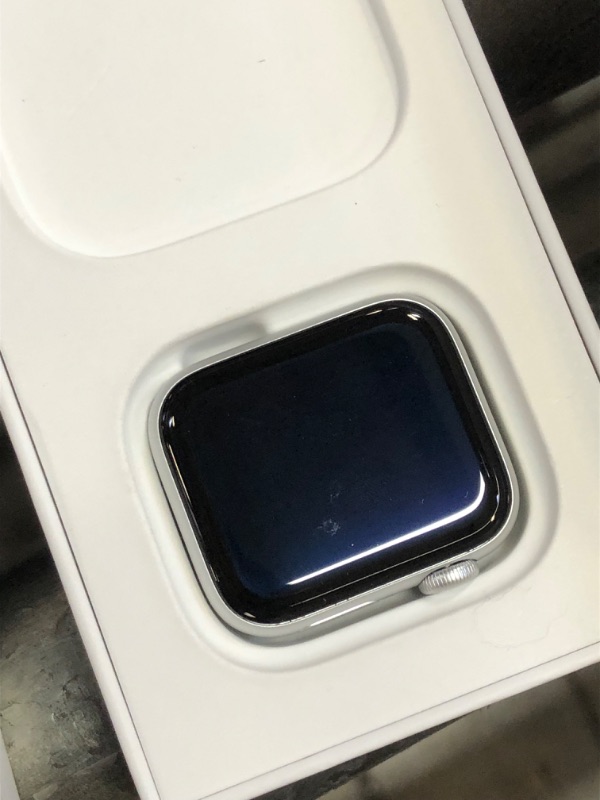 Photo 3 of Apple Watch SE (Gen 1) [GPS 41mm] Smart Watch w/ Silver Aluminium Case with Abyss Blue Sport Band. Fitness & Activity Tracker, Heart Rate Monitor, Retina Display, Water Resistant 41 mm GPS Silver Aluminium Case with Abyss Blue Sport Band