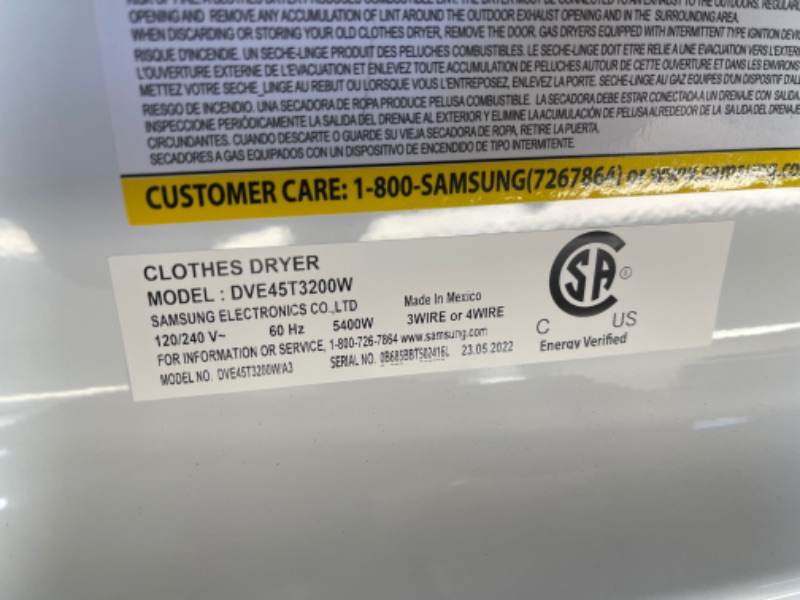 Photo 8 of 7.2 cu. ft. Electric Dryer with Sensor Dry in White. COSMETIC DMG; SCUFFS/SCRATCHES, BROKEN SCREW CORD BRACKET. INTERIOR UNUSED. 