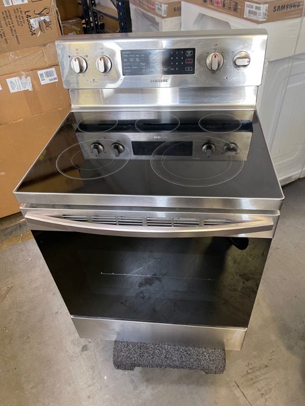 Photo 2 of 5.9 cu. ft. Freestanding Electric Range with Convection in Stainless Steel EXTERIOR COSMETIC DMG (DIRTY, SCUFFS)  INTERIOR CLEAN, MINOR USE, no power cord 
