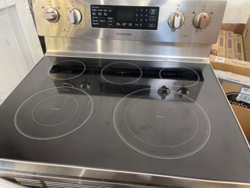 Photo 8 of 5.9 cu. ft. Freestanding Electric Range with Convection in Stainless Steel INTERIOR DIRTY, SCUFFS/SCRATCHES (COSMETIC) DMG TO EXTERIOR 
