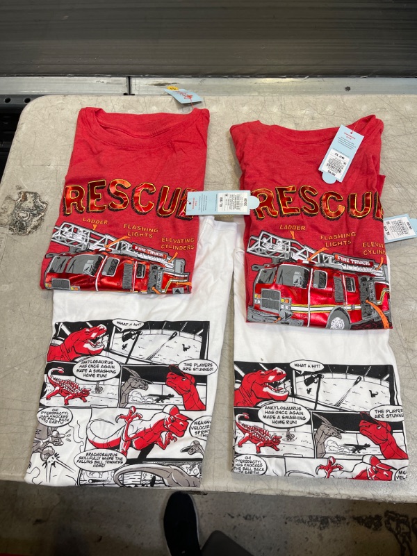 Photo 3 of Boys' 'Dinosaurs Playing Baseball' Graphic Short Sleeve T-Shirt - Cat & Jack™
AND
Boys' 'Rescue Squad' Short Sleeve Graphic T-Shirt - Cat & Jack™ Bright
SIZE XL
