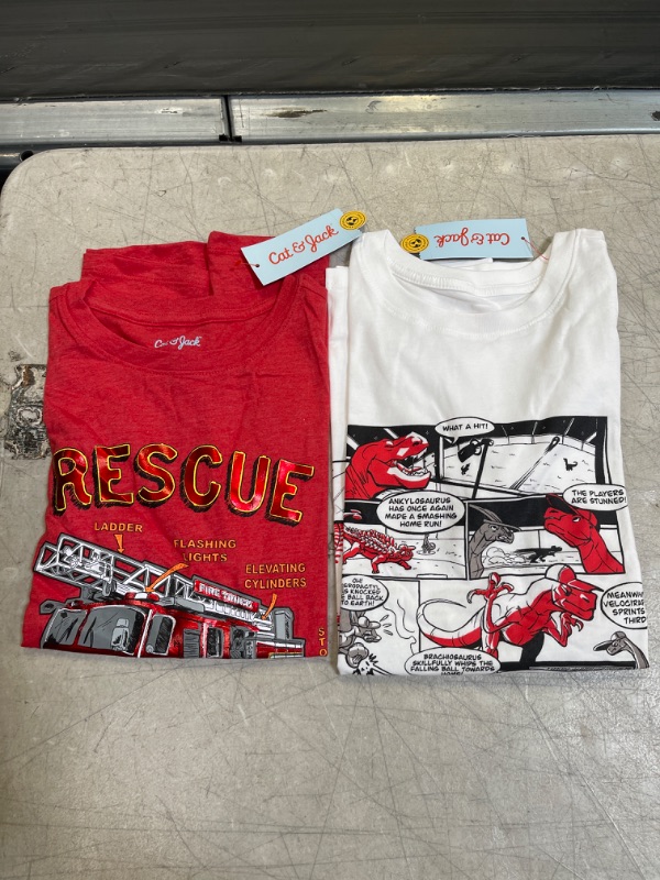 Photo 3 of Boys' 'Rescue Squad' Short Sleeve Graphic T-Shirt - Cat & Jack™ Bright
AND
Boys' 'Dinosaurs Playing Baseball' Graphic Short Sleeve T-Shirt - Cat & Jack™
SIZE L-XL
