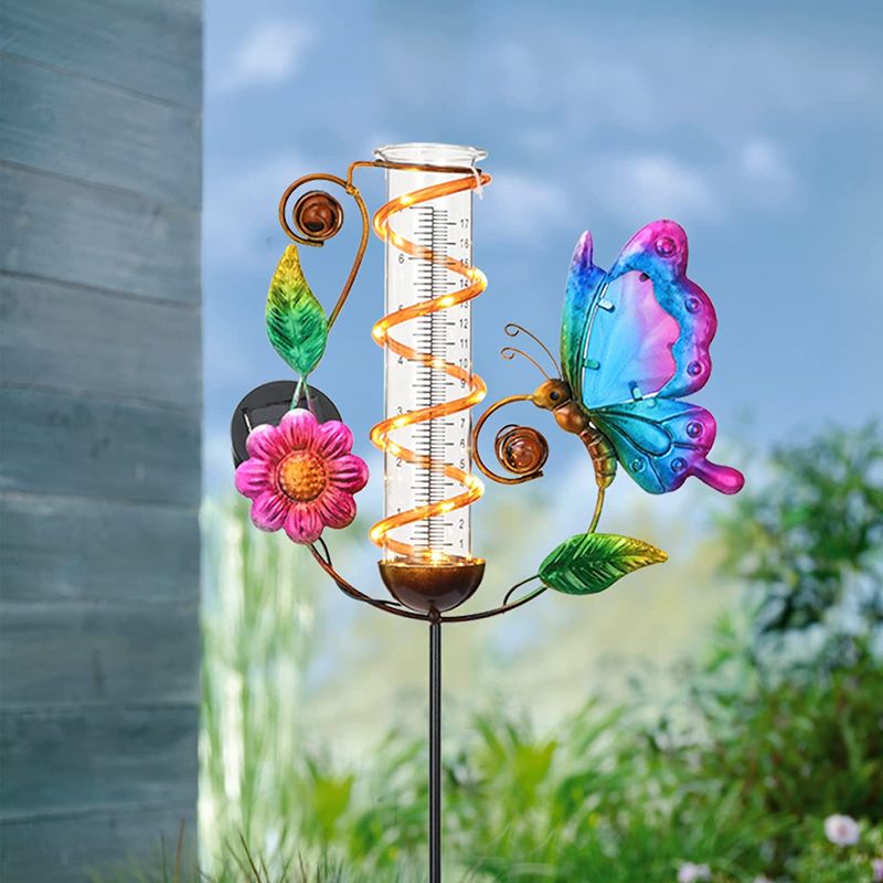 Photo 1 of BAYN 36.3” Rain Gauge Outdoor Solar Powered 10 LEDs 7” Tube Garden Butterfly Metal Decorative Stake with Waterproof Large Glass Tube Rain Guage for Yard, Garden, Patio, Lawn
