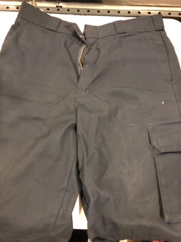 Photo 1 of DICKEYS LOOSE FIT DARK BLUE CARGO SHORTS
SIZE UNKNOWN