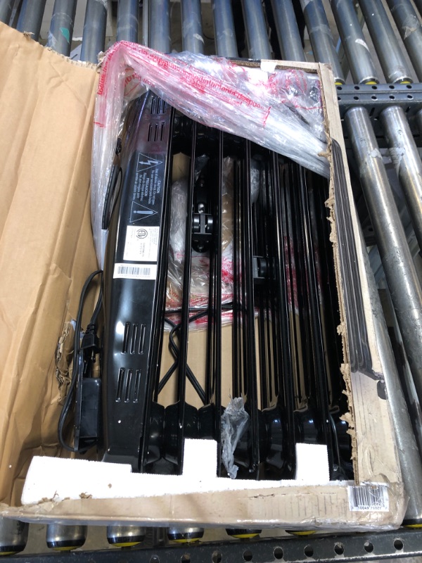 Photo 1 of PELONIS PHO15A2AGB, Basic Electric Oil Filled Radiator,black space heater, 26.10 x 14.20 x 11.00------barely used-------missing some items and hardware