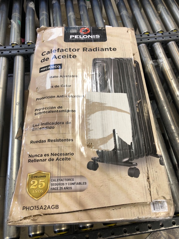 Photo 1 of PELONIS PHO15A2AGB, Basic Electric Oil Filled Radiator,black space heater, 26.10 x 14.20 x 11.00------barely used-------missing some items and hardware