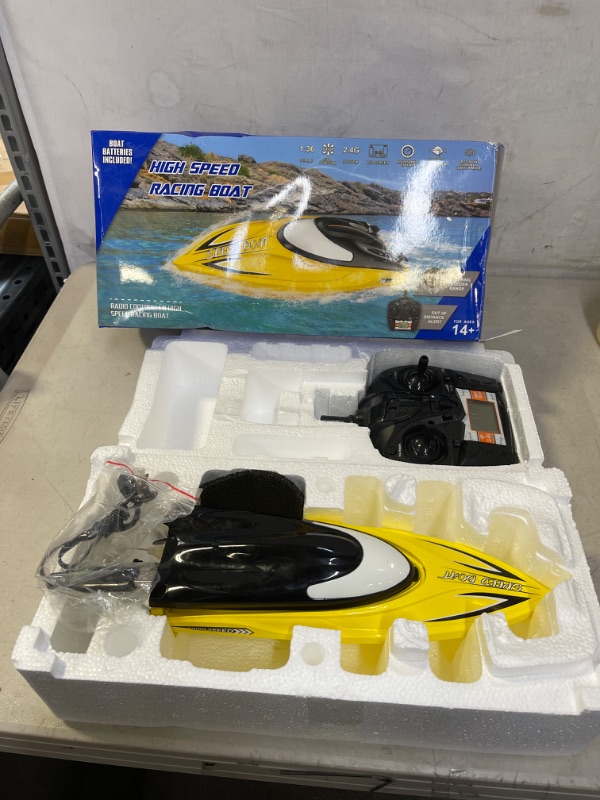 Photo 2 of  RC Boat - Remote Control Boat for Pools and Lakes, 25 km/h Fast RC Boats for Adults and Kids, 2.4Ghz Self-Righting Racing Boats with 2 Rechargeable Battery, Low Battery Alarm, Yellow
