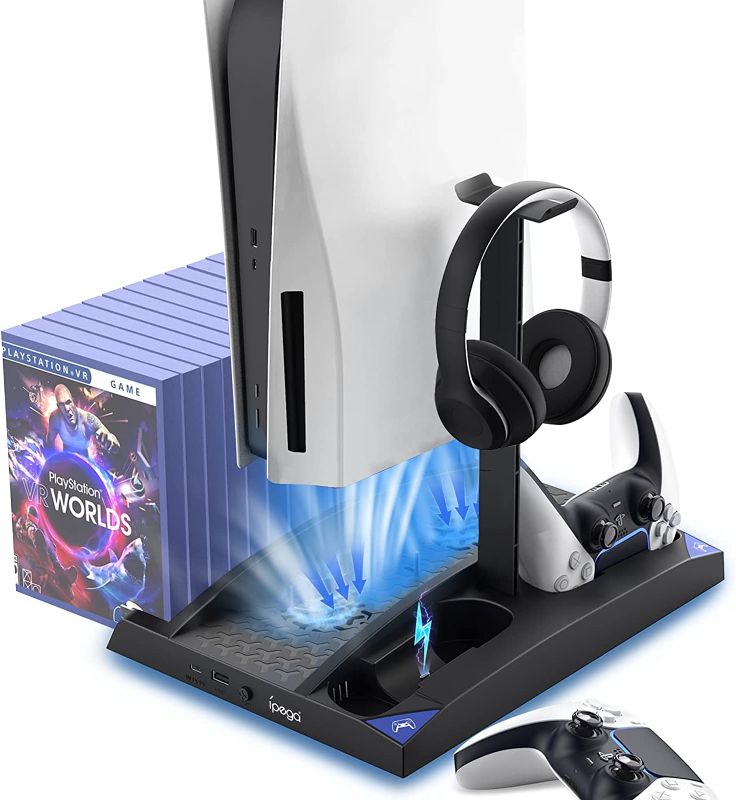 Photo 1 of PS5 Stand with Cooling Fan and Dual Controller Charger Station for Playstation 5 PS5 Console, Cooler Fan with Charging Dock Station and 17 Games Storage
