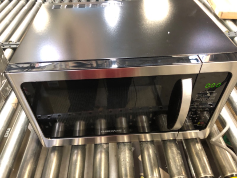 Photo 1 of Farberware Professional 1.2 Cu. Ft. 1100-Watt Microwave Oven with Sensor Cooking, Stainless Steel/Black Body Wrap
