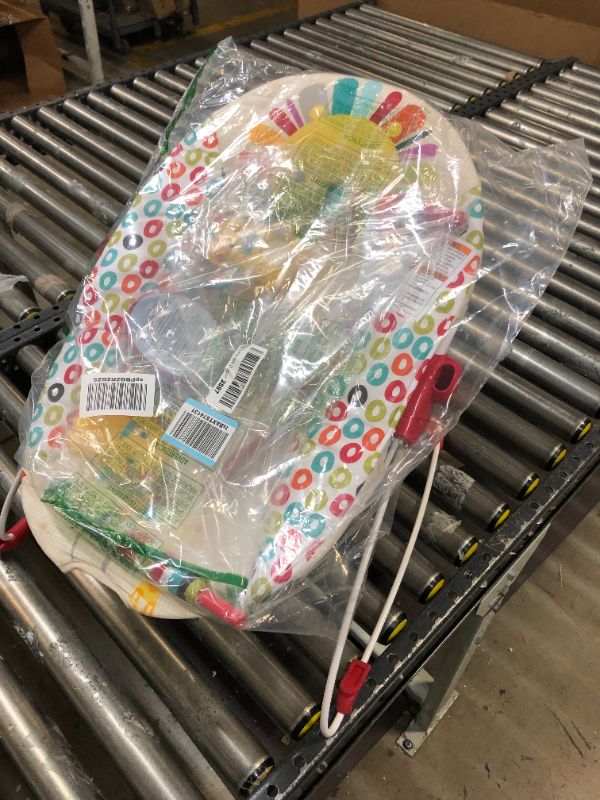 Photo 1 of Bright Starts Playful Pinwheels Portable Baby Bouncer with Vibrating Infant Seat and-Toy Bar, 19.8x13.1x3.4 Inch, Age 0-6 Months
