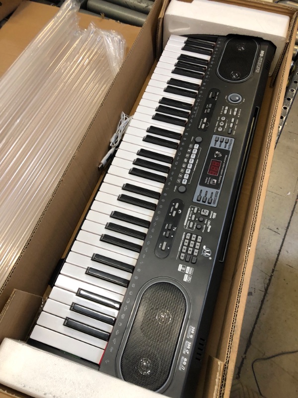 Photo 1 of WOSTOO Piano Keyboard 61-Key Digital Electric Music- Portable Electronic Keyboard for Beginners Kids Adults with Piano Stand --- UNABLE TO TEST / MISSING POWER CORD